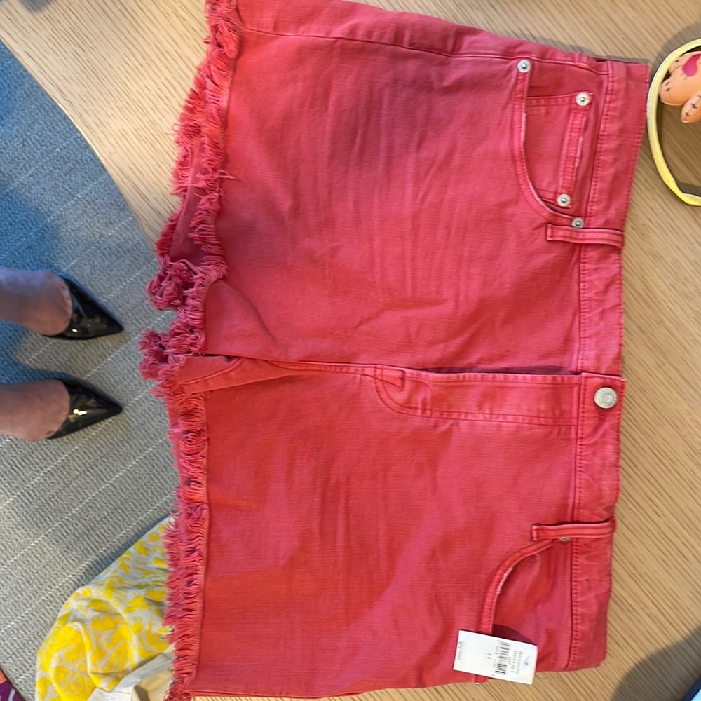 Gap 34R red shorts with frayed hem.
